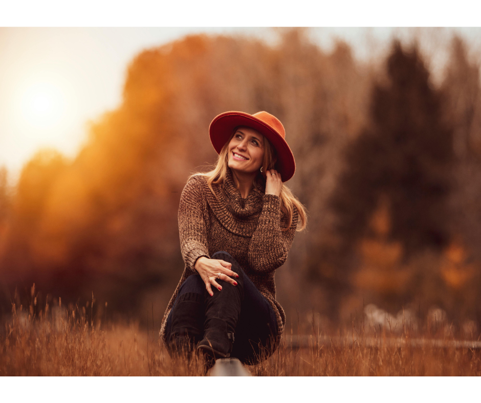 Midlife woman outdoors representing emotional wellbeing and personalised menopause care