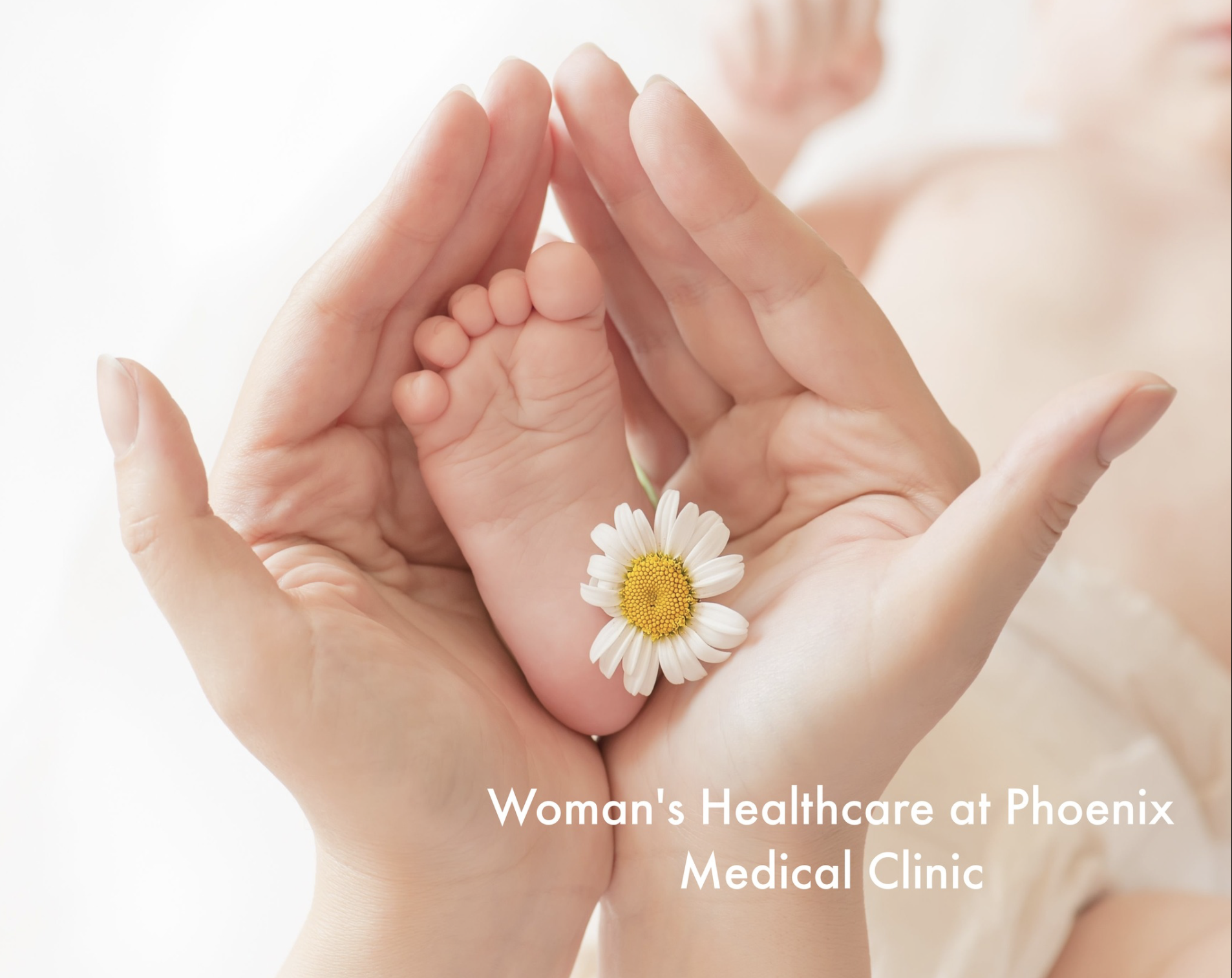 Newborn baby’s feet held in hands, symbolising postnatal and ongoing women’s health care at Phoenix Women’s Health.